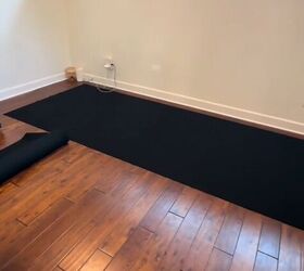 This is the optimal way to position a rug in a bedroom