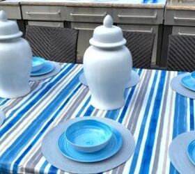 outdoor dining summer tablescape with a sophisticated blue theme