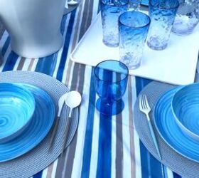 outdoor dining summer tablescape with a sophisticated blue theme