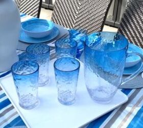 outdoor dining summer tablescape with a sophisticated blue theme