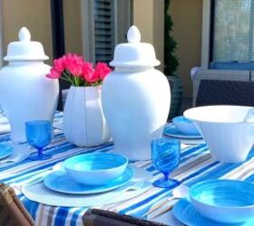 outdoor dining summer tablescape with a sophisticated blue theme