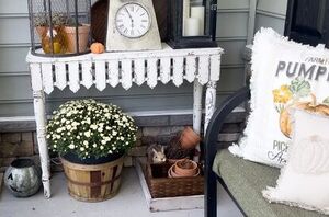 We love her ideas on how to make a porch warm and inviting for fall