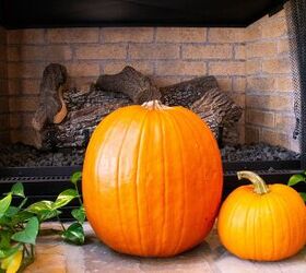 autumn awaits our 5 favorite fall decor finds on amazon, Pumpkins by the fireplace image via Canva