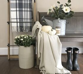 Her palette for fall decoring this year is wood, white, and green, and we are loving it