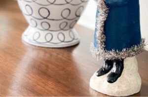 These are not your typical red-suited Santas, but they make really charming decor pieces