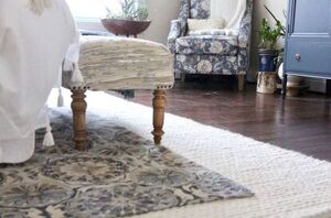 This simple rug hack adds so much warmth and comfort to her bedroom