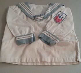 A charming way to display a vintage baby garment