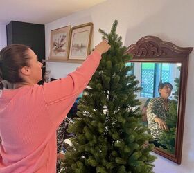 Fluffing, lighting, and decorating secrets for the most realistic artificial tree yet