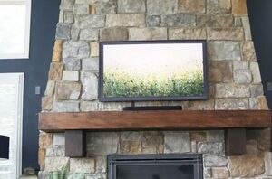 She added the most unexpected decor pieces to her fireplace—and it turned out shockingly cozy