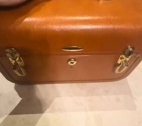 Use an old suitcase to seriously upgrade your laundry room