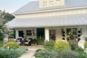 She says she hates summer—her outdoor spaces and garden tell a different story