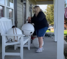 After seeing this, we're adding giant white ornaments to our porch decor