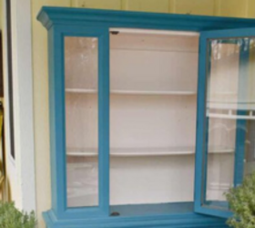 She put a hutch on her porch and filled it with the sweetest things