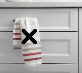 Ditch the old towel bar and start hanging your kitchen towels like this!