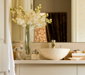 This is the first thing designers ALWAYS change in a cramped bathroom
