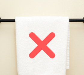 We've never seen anyone hang their bathroom towels like this (it's adorable)