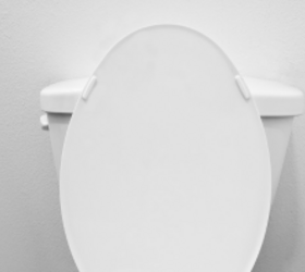12 smart and stylish ways to fill the wall behind your toilet