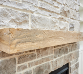 People are replacing rustic stone fireplaces with this sleek look in 2025