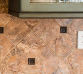 The one thrift-store find hides kitchen outlets beautifully